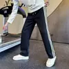 Temporada de primavera y otoño, pantalones de chándal de pierna recta para estudiantes de secundaria, pantalones deportivos modernos para hombre, nuevo estilo 2026, pantalones holgados y casuales para adolescentes