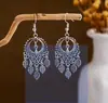 Aretes colgantes de moda huecos para mujer de estilo exótico europeo y americano transfronterizo, retro, literario, clásico y digno, con gancho para la oreja que combinan con todo