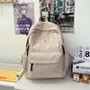Mochila de gran capacidad para mujer, modelo nuevo para estudiantes de secundaria y universitarios, mochila de viaje a cuadros elegante y versátil