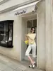 Top de punto off-shoulder estilo 'woppei pure desire' para mujer, principios de otoño 2026, ligero, versátil, top que realza la clavícula