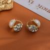 Pendientes explosivos retro de doble cara con perla y diamantes, de alta gama, con hebilla de oreja de diseño nicho.
