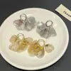 Pendientes Minimalistas de Borla de Pétalo Nicho Versátiles Pendientes de Gama Alta Moda de Lujo Ligero Pendientes de Personalidad Venta al por Mayor