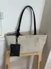 Yue Zi 2026 Verão Nova Moda Simples Grande Capacidade Tecido de Nylon Bolsa Versátil para o Dia a Dia Bolsa de Ombro Único Bolsa Tote