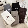 Calcetines de lunares para cachorros de otoño e invierno, calcetines de media pantorrilla para mujer, cálidos, estilo ballet, estilo coreano, calcetines largos con borde fruncido, dando un aspecto juvenil y femenino