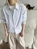 Camisa a rayas azul y blanco, fluida e intelectual, diseño holgado tipo chaqueta, top de alta gama, moderno