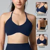 Top de tirantes cruzados para yoga transfronterizo con tirantes ajustables, hermoso diseño en la espalda, sujetador deportivo de nylon 66 para mujer, sensación de segunda piel, versátil