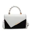 Moda textura cor combinação nova 2025 cor contrastante primavera casual simples estilo estrangeiro bolsa transversal pequena quadrada para mulheres