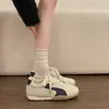 Zapatillas de entrenamiento alemanas de suela plana para mujer 2026 nuevo resorte versátiles populares zapatillas deportivas casuales con cordones Zapatos Forrest Gump zapatillas blancas