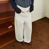 Calça casual de corte tridimensional de cintura média a alta, tendência 2026, estilo workwear, perna larga para mulheres no outono, com caimento solto e fluido.