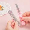 Fábrica Tian Gao Venta al por mayor Cuchillo de utilidad de garra de gato Mini Lindo Dibujo Animado Cortador de papel Abrepaquetes Portátil