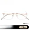 Gafas sin montura para mujer con miopía de alto grado pueden equiparse con cristales anti luz azul de titanio puro ultraligero y monturas de alta gama sin montura.