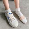 Venta al por mayor en stock Verano para niñas Calcetines cortos invisibles transpirables de seda de vidrio blanco de corte bajo Calcetines cortos para hombre Calcetines de otoño e invierno