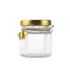 Al por mayor En stock Mini Tarro de Miel Transparente de Vidrio Set de Mermelada Botella Dispensadora 45ml Botella Dispensadora de Alimentos Hexagonal