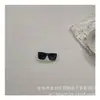 Gafas de sol para niños de la calle fritas de principios de primavera estilo occidental para bebé hombre y mujer forma cóncava para viajar gafas de sol a prueba de sol