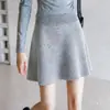 Falda Midi de Punto de Lana de Estilo Coreano Versátil de Cintura Alta Acampanada Adelgazante para Mujer Tendencia Otoño/Invierno 2026