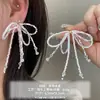 Brincos de Laço Coreanos, Brincos de Luxo Leve e de Alta Qualidade para Mulheres, Design de Nicho Moderno, Brincos Modernos e Elegantes, Atacado