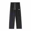 Pantalones Casuales para Hombre Primavera y Otoño 2026 Nuevo Estilo Holgado Caída Pierna Recta de Moda Marca Ins Pantalones Deportivos Color Sólido con Parche