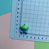 Dibujos animados jugable Denim chico aeroespacial diy funda de teléfono con pegamento de crema hebilla de zapato pasador accesorios de joyería de resina venta al por mayor