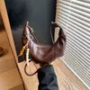 Bolsa Pequeña Tipo Dumpling Casual para Viajes Diarios para Mujeres 2026 Nueva Moda Trendy Versátil Bolso de Hombro con Pliegues Aspecto Relajado Bolso Cruzado