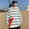 Camiseta de manga larga a rayas con estampado digital, moderna y versátil, un nuevo estilo casual para hombres y mujeres, perfecta para otoño e invierno