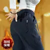 Pantalones deportivos de algodón para hombre al por mayor transfronterizos otoño e invierno engrosados cálidos punto de sarga pantalones casuales adelgazantes de moda pantalones deportivos con forro polar