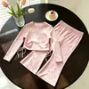 Roupas Infantis Estilo Coreano 2026 Novidades Primavera/Outono Conjunto de Duas Peças para Meninas Bebês: Blusa Floral de Manga Longa com Calça Flare e Camiseta com Cordão