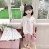 Comercio Exterior Conjunto de Verano para Niñas Nuevo Elegante Moderno Floral Manga Corta Top y Shorts Conjunto de Dos Piezas Venta al por Mayor