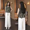 Conjunto de Duas Peças para Mulheres: Top Floral Retro Sem Mangas com Fita e Calça Wide-Leg, Elegante e Emagrecedor para o Trabalho com Estampa Artística