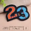 Parches Bordados para Computadora al por Mayor 23 Insignias Pegatinas de Tela Bordadas Números Letras Dedo Medio Seis Parches Bordados Decoración de Ropa de Marca de Moda