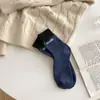 Calcetines gruesos con forro de felpa de tubo cálidos para mujer, calcetines populares retro versátiles para pareja, calcetines de rizo con letras para hombre y mujer