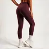Pantalones de yoga Mingda de cintura alta que levantan glúteos, amigables con la piel, con bolsillos laterales, ajustados, elásticos, moldeadores de abdomen, pantalones largos para deportes y fitness