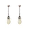 Pendientes de botón de magnolia plata s925 incrustados con jade Hetian simples de moda para mujer productos transfronterizos