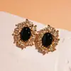 Pendientes ovalados de hoja de aguja de plata transfronterizos europeos y americanos, pendientes estilo Maillard, pendientes llamativos de lujo ligero de alta gama al por mayor