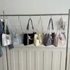 Bolso de mano de moda para mujer 2026 nuevo versátil para el trabajo cadena de perlas texturizada gran capacidad bolso de hombro informal tote