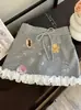 Falda de Encaje con Puntadas y Graffiti Dulce Estilo Coreano para Mujer Verano Nueva Ajustada con Sentido de Diseño Adelgazante