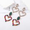 Moda europea y americana exagerada personalidad moderna creativa aleación diamante color amor clip para la oreja en forma de corazón aretes colgantes grandes para mujer