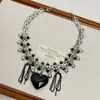 Dulce Fresca Chica Picante Amor Borla Lazo Negro Collar Femenino Nicho Único Sentido del Diseño Personalidad Cadena para Clavícula Accesorios