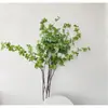 Flor artificial Magatu planta verde falsa paisajismo interior decoración de piso de sala de estar reloj colgante japonés decoración de rama única Magatu