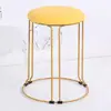 Taburete para el hogar Taburete de acero nórdico de lujo ligero Taburete simple de tela engrosada Taburete para mesa de comedor Taburete redondo de moda Taburete de red de celebridades dorado