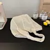 Bolsa de punto transfronteriza europea y americana, bolsa de paja hueca de gran capacidad casual, bolsa de playa de un solo hombro estilo relajado, bolsa de mujer para vacaciones