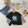 Sudadera con Capucha para Niños Otoño 2026 Nueva Primavera y Otoño Niños Manga Larga Falso Dos Piezas Estampado de Dibujos Animados Top Algodón Puro Versátil de Moda