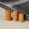 Sándalo, intrincadamente tallado con el mantra de seis sílabas y el símbolo de mil caracteres, utilizado como cuenta para pulseras, collares y accesorios de joyería DIY