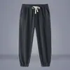 Pantalones de Hombre 2026 Primavera y Otoño Algodón Lino Pantalones Largos Marca de Moda Verano Ajustados Lino Pantalones Jogger Casuales Cortos para Hombre