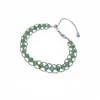 Pulsera geométrica abierta de cuentas de vidrio con circonita de dopamina, minimalista y única, con una estética de alta gama y dulce.