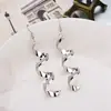 Recolección Transfronteriza de Pendientes Metálicos con Hojas Geométricas Escarchadas, Ganchos para Orejas Creativos Personalizados con Borla de Hoja Redonda Hueca