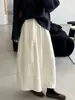 Falda midi casual acolchada texturizada con patrón de rombos blancos, nuevo estilo coreano 2026, gruesa y versátil, adelgazante y favorecedora