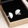 Corea del Sur simples estilo francés elegantes pendientes de celebridad de Internet versátiles para uso diario pendientes de perla grande coloridos geométricos pendientes para mujer