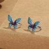 Clip de oreja de mariposa de esmalte azul quemado Jingtai transmisión en vivo para mujer manualidad de epoxi plata tailandesa pendientes simples versátiles pendientes personalizados