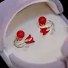 Aguja de plata 925 Perla Roja Ojo de gato festivos combinan con todo elegantes pendientes de alta calidad pendientes de borla simples adorables para mujer