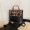 Cross-border popular este ano contraste cor nicho leopardo impressão bolsa 2024 nova all-match mochila feminina bolsa de viagem